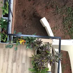 A duplicate image of the overhead view, showing how even a narrow balcony can be transformed with carefully selected container plants.