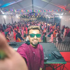 A quick selfie from the DJ console during a massive Dandiya night. I love the energy of festive events, blending traditional Garba tracks with high-energy Bollywood music to keep everyone dancing.