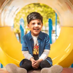 A perfect playground portrait. I use the fun environment of a park to capture bright, happy smiles from kids.