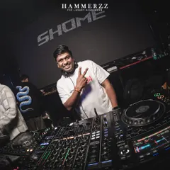 Peace and good vibes from the DJ booth. A quick pose for the camera while keeping the party going at Hammerzz.