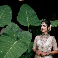 A beautiful bride looking radiant on her special day. My goal is to create mehendi that not only looks beautiful on its own but also enhances the bride's overall glow and confidence.