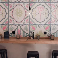 This mockup shows how my 'Tropical Tapestry' design can transform a commercial space like a cafe or boutique. The repeating tile pattern adds a vibrant, artistic backdrop that makes the environment feel custom and memorable.