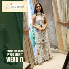 Upcycling can be incredibly modern and chic. For this client, I transformed an old saree into a stylish white gharara suit with a zero-neck top. It's a perfect example of how sustainable fashion can be fashion-forward.