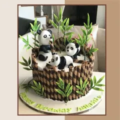 This adorable panda-themed cake is an example of the custom designs I can create for birthdays. The chocolate wafer sticks and fondant pandas make it a fun and delicious centerpiece.