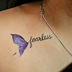 "Fearless" era inspired temporary tattoo. The purple glittery mermaid tail adds a touch of magic and sparkle.