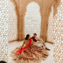 Using the stunning architecture of Amer Fort in Jaipur, we create pre-wedding portraits that are both royal and romantic, with light filtering through the intricate jali work.