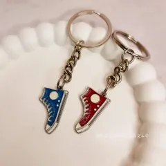 The blue and red shoe charm keychains, perfect for adding a pop of color to your everyday carry.