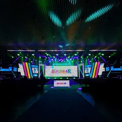 The vibrant, custom-branded stage for the 'Malhaar' corporate event. My VJ setup integrates seamlessly with the event's theme and branding for a cohesive look.