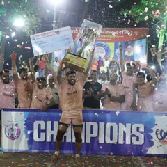 This is the feeling of victory. Our senior team celebrating a major tournament win, holding the championship trophy high amidst a shower of confetti. Hard work and discipline lead to moments like these.