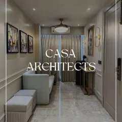 A promotional image for my services, set against the backdrop of an elegantly designed hallway, emphasizing my brand as an architect of fine spaces.