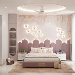 A whimsical kids' bedroom design for a project at ATS Rhapsody. The feature wall is adorned with custom wallpaper and illuminated butterflies, and the bed has a unique, cloud-like lavender headboard, creating a magical atmosphere.