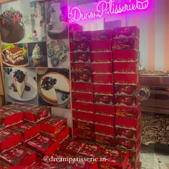 Stacks of festive hampers ready for a corporate Christmas order. My kitchen was buzzing as we prepared over 500 of these boxes, filled with delicious treats, for delivery to clients in Andheri.