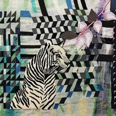 A tigress rendered in monochrome threadwork, set against a vibrant, geometric jungle. This piece from the Protagonist Series captures her quiet confidence and power. The fine embroidery allows for a level of detail that brings her intense gaze to life.