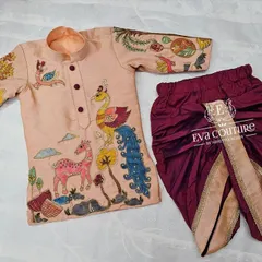 Another view of the hand-painted boys' kurta set. The intricate details and bright colors make this a truly unique piece of wearable art.