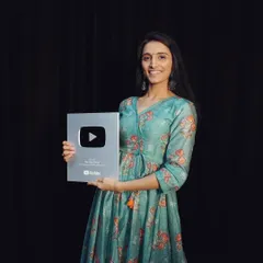 A proud moment for our co-founder Hasti, holding our YouTube Creator Award. This milestone represents years of hard work, passion, and the amazing support from our followers.