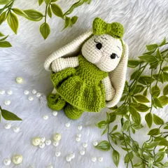 Look at this adorable bunny with her long, floppy ears and sweet green dress! I love when customers have unique ideas, and this long-eared bunny was a joy to bring to life. She is so soft and posable.