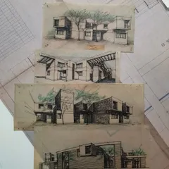 A collection of early hand-drawn elevation studies from past projects.