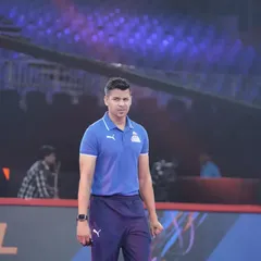 A moment of focus on the sidelines of a Pro Kabaddi League match. Every detail matters when you're competing at the elite level.