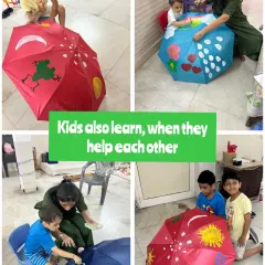 I believe that children learn best when they help each other. Here, my little artists are working together to paint their own umbrellas, sharing ideas and encouragement. This is how we build teamwork and friendship in our studio.