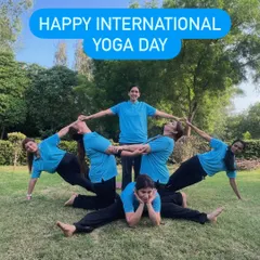 A creative and fun group pose with me at the center, celebrating the spirit of yoga together.