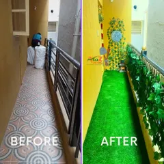 Even a narrow entrance corridor can become a welcoming green space. Here, I replaced dated tile with bright artificial turf and added artificial vines to the railing, creating an inviting and maintenance-free entryway.