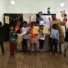 Look at these happy faces! After a super fun storytelling session, our little creators get to show off the amazing puppets and artwork they made. This is what pure joy and imagination look like.