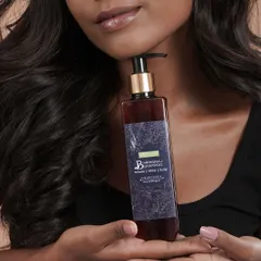 This is our hero product, the Bhringraj Shampoo, designed to give your hair volume, shine, and strength. It's a sulfate-free Ayurvedic formula that gently cleanses without stripping natural oils, making it perfect for tackling hair fall and nourishing the scalp.