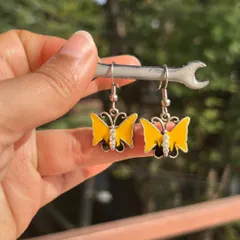 The same adorable butterfly design, this time in a bright and cheerful yellow. These are lightweight and perfect for daily wear.