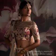 A closer look at the premium custom bridal wear I create. The boat neck blouse is adorned with detailed floral embroidery, designed to complement the grandeur of your wedding day.