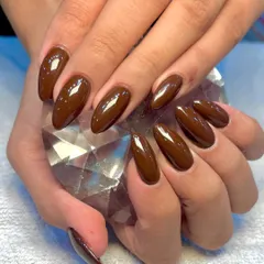 This is how my most popular "Espresso Nails" look. It's a rich, deep brown gel polish that is sophisticated, trendy, and looks beautiful on these almond-shaped extensions.
