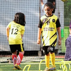 Girls in the game, leading the way. Here, two of our young players work on their agility and footwork through ladder drills. I provide a supportive environment where female athletes can thrive and master their skills.