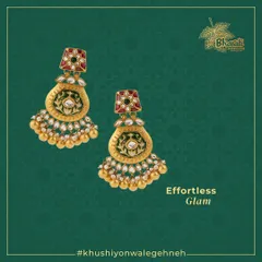 Elevate your look with these stunning Meenakari earrings. The intricate designs are embellished with moti, kundan, pearls, and diamonds, showcasing a perfect balance of color and glamour.