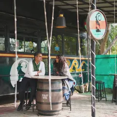 A casual and cool pre-wedding look. We chose comfortable yet stylish outfits that reflected our personalities, perfect for a relaxed cafe setting. I believe pre-wedding styling should be about capturing who you are as a couple.