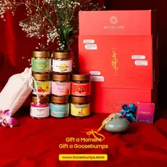 My "Nok Jhok" Raksha Bandhan Box is filled with a variety of our best treats. This image displays the entire collection, including a surprise pouch of free goodies, making it a complete and heartfelt gift.