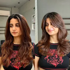 A before and after of this soft, dimensional haircut and color. The client's smile in the "after" shot says it all.