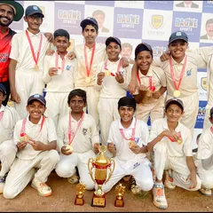 Emerging as champions at the CN Ravikiran Memorial Cup. Our players celebrate with their medals and the championship trophy after a hard fought 3 wicket victory in the finals.