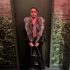 A candid moment from a night out. Even when I'm off-duty, I love a chance to dress up and have fun with fashion.