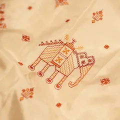 A detailed shot of the Kasuthi embroidered elephant motif, showcasing the precision and skill required for this traditional art form.