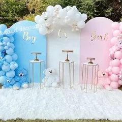 I love creating exciting gender reveal setups like this one. The distinct pink and blue backdrops, adorable teddy bears, and a plush white carpet make the big reveal a picture-perfect moment for the whole family.