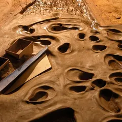 A detail of the clay model for our Bhopal Gas Tragedy Memorial proposal. The pitted, scarred earth represents the contaminated 'brown field' site, a memory of the tragedy that the new landscape is designed to heal.