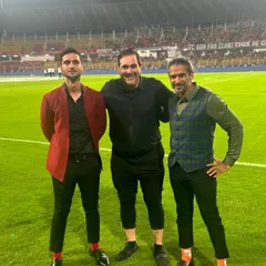 A more playful and eclectic set of outfits for the ISL team. I enjoyed mixing patterns and bold colors, like the checked vest and bright red blazer, to bring personality to the broadcast.