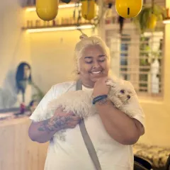 That smile says it all. A fresh, platinum blonde look and a cuddle with her favorite companion. Creating great hair is our job, but creating a happy, comfortable atmosphere is our passion.