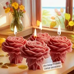A set of four rose pillar candles, creating a beautiful and romantic ambiance. These are a popular design that you can learn to make in my candle workshops.