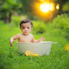 We also offer fun and creative concepts for outdoor shoots, like this adorable bubble bath setup. It's a unique way to capture playful moments with your little one.