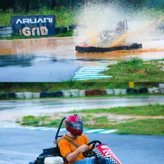 Making a huge splash on the wet track. This is what pure, unadulterated fun looks like when the weather adds an extra layer of excitement to the race.