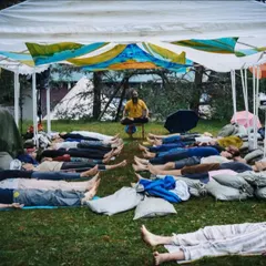 Here you see a Group Sound Bath, where participants lie down and let the healing sounds of singing bowls and gongs wash over them. In these sessions, we create a shared space of tranquility, allowing the collective energy to deepen the meditative and healing experience for everyone involved.