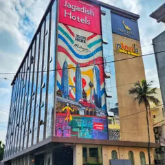 An angled shot of the Malaysia mural, showing how it dominates the building's architecture and can be seen from down the street.