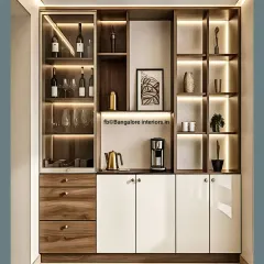 A sophisticated crockery and bar cabinet perfect for modern dining areas. This unit features a mix of wood-grain drawers, glossy white cabinets, and glass-fronted display sections with integrated lighting, plus a dedicated coffee station counter.
