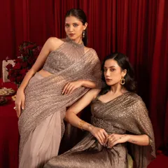 A dual-model shot showcasing two complementary evening wear looks. The composition is balanced and elegant, perfect for a campaign that needs to display a collection's range.