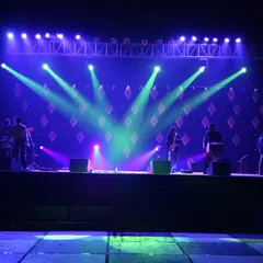 A professional stage and lighting setup for a live band performance. I manage all technical aspects, including sound systems and lighting design, to ensure a flawless show.
